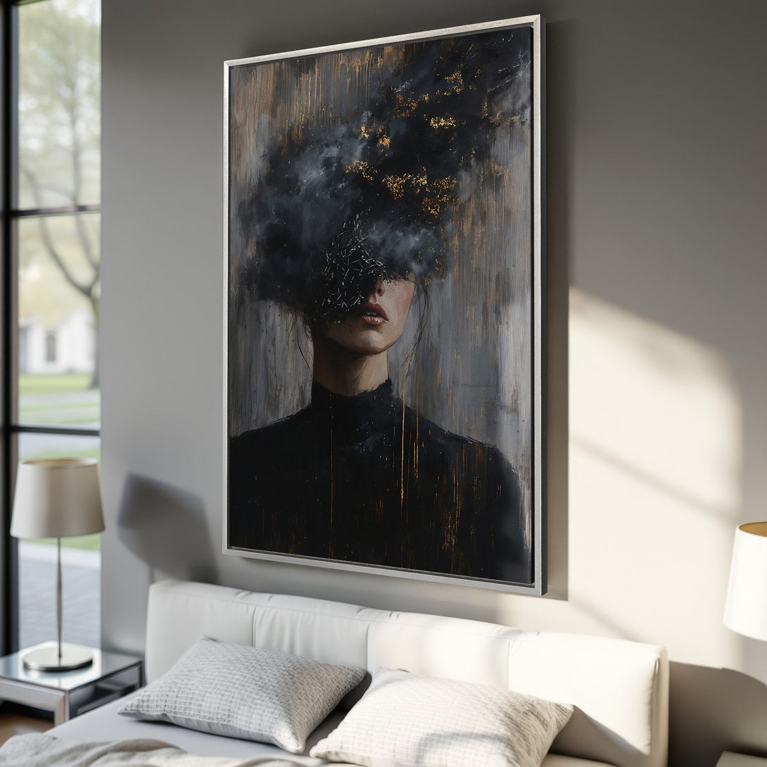 Framed Wall Art featuring a woman's portrait with abstract black and gold accents. Modern art canvas print in a bedroom, neutral color palette.