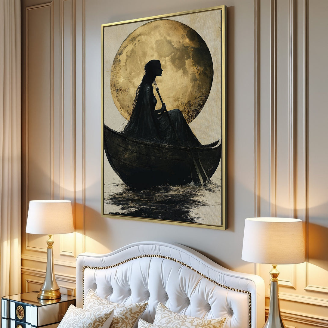 Canvas Print featuring a silhouette of a woman in a boat with a moon backdrop, in a neutral, black, and gold color palette. Ideal for modern home decor.