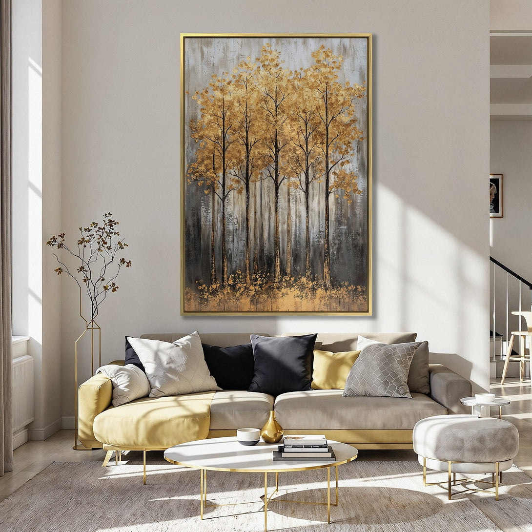 Canvas Print of golden trees on a textured gray background, displayed in a kitchen with a soft pink wall. Modern art with warm tones.