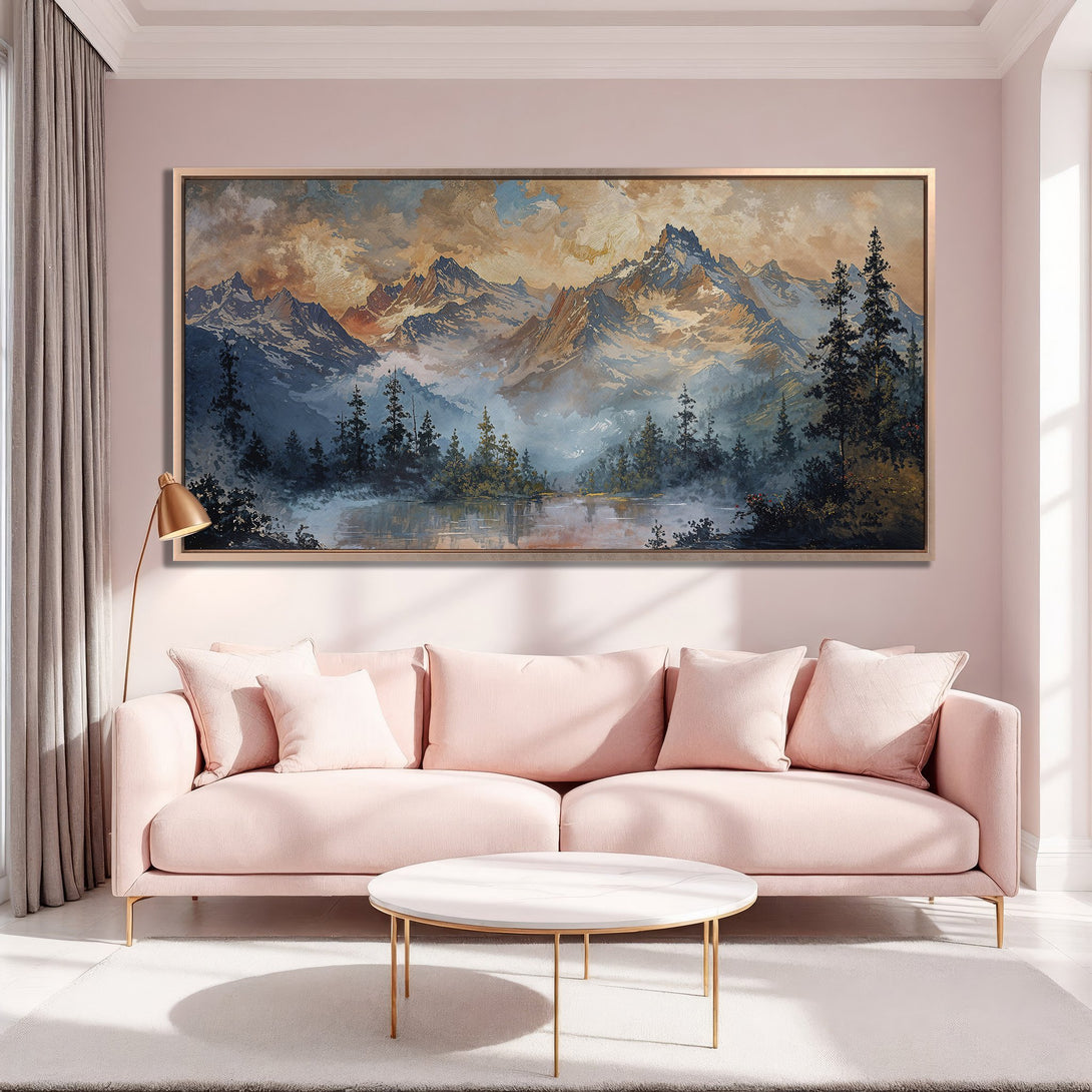 Framed Wall Art: Majestic mountain landscape Canvas Print in muted blue, gold, and pink tones, adding an elegant touch to a cozy living room.