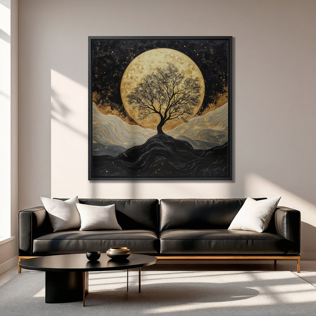Framed Wall Art featuring a tree silhouette against a moon, in a black, gold, and gray color palette. Modern abstract art for your home.