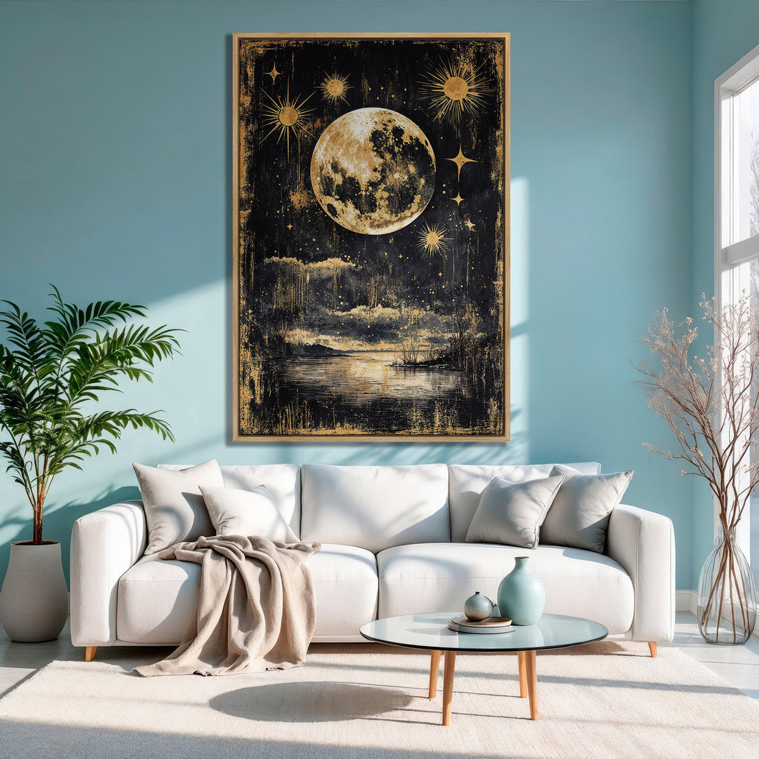 Framed Wall Art: Celestial moon and stars canvas print in a modern living room. Black, gold, and teal color palette. Elevate your space with art!