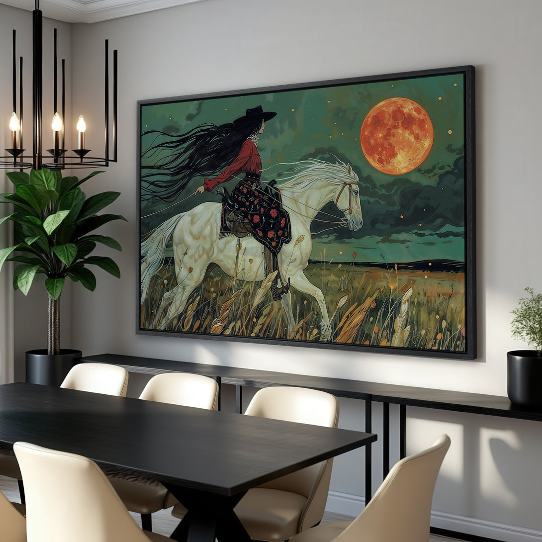 Framed Wall Art: Woman on horse under a red moon. Artistic style, green, red, and gold color palette. Perfect wall decor for any room!