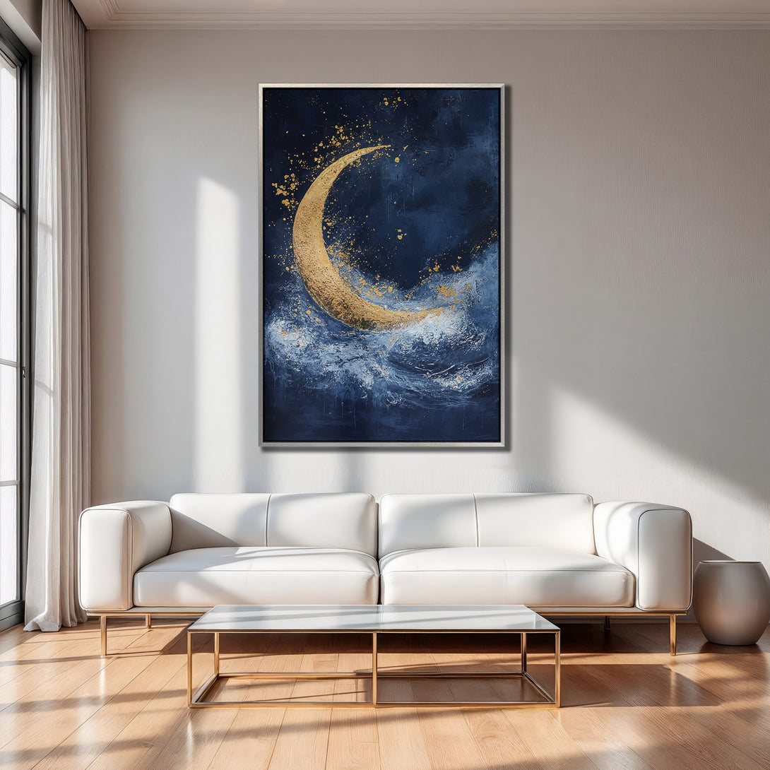 Framed Wall Art featuring a gold crescent moon abstract painting, displayed in a modern interior with a blue, gold, and white color palette.