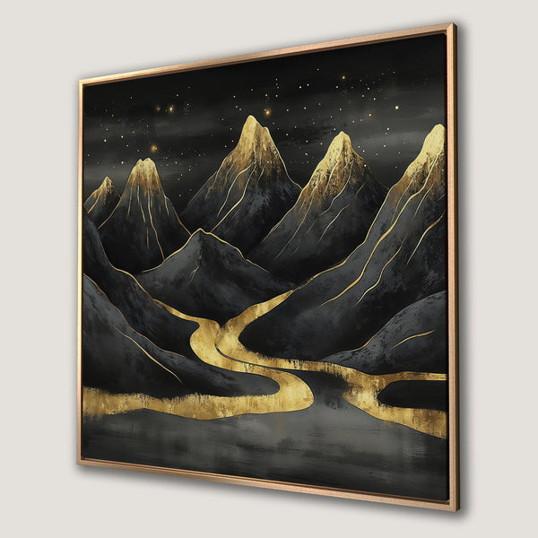 Framed Wall Art featuring abstract mountain landscape in black and gold. Modern canvas print with elegant color palette, perfect for living room decor.