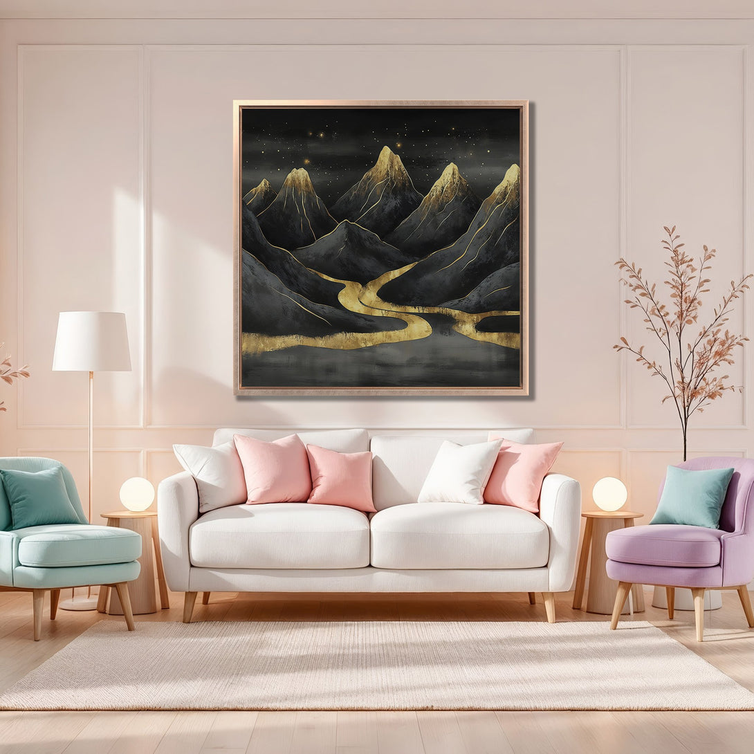 Framed Wall Art featuring abstract mountain landscape in black, gold, and gray tones. Modern art decor in a stylish interior with a blush color palette.
