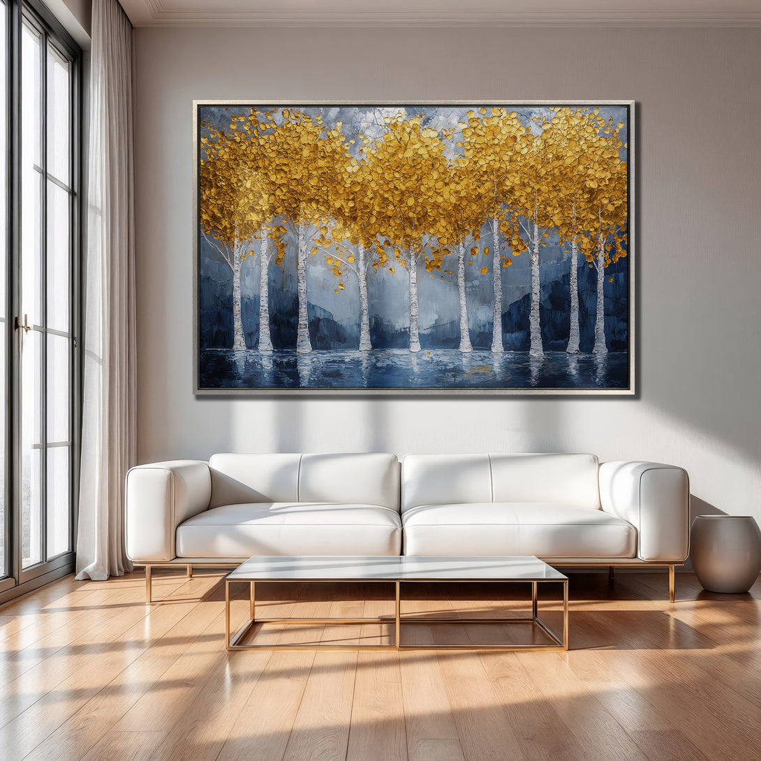 Framed Wall Art: Abstract painting of golden trees against a blue and grey backdrop. Modern style, perfect for living room decor.