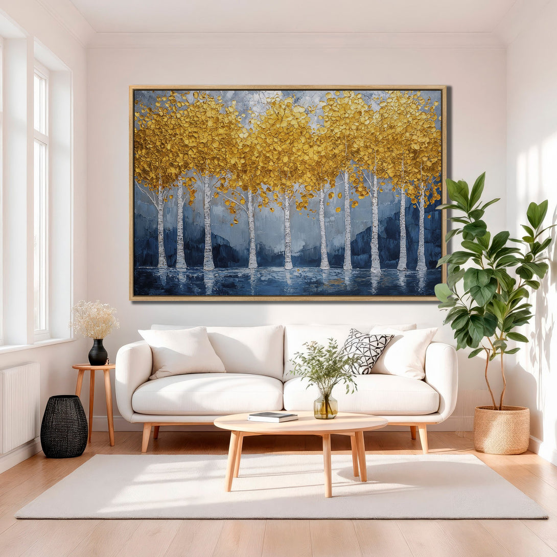 Framed Wall Art: Golden tree landscape canvas print in a modern interior. Features a blue, gold, and white color palette for a stylish home decor accent.