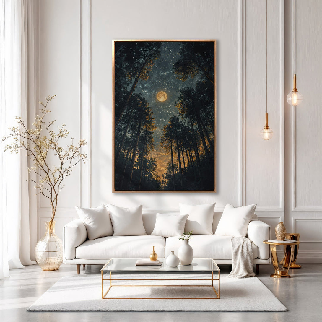 Framed Wall Art of a forest scene with a moon, displayed in a modern living room. Dark blues, golds, and whites create a serene ambiance.