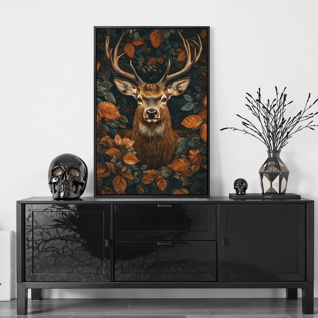 Framed Wall Art featuring a majestic deer in autumn leaves. Earthy tones of brown, orange, and green create a warm, inviting aesthetic for your home decor.