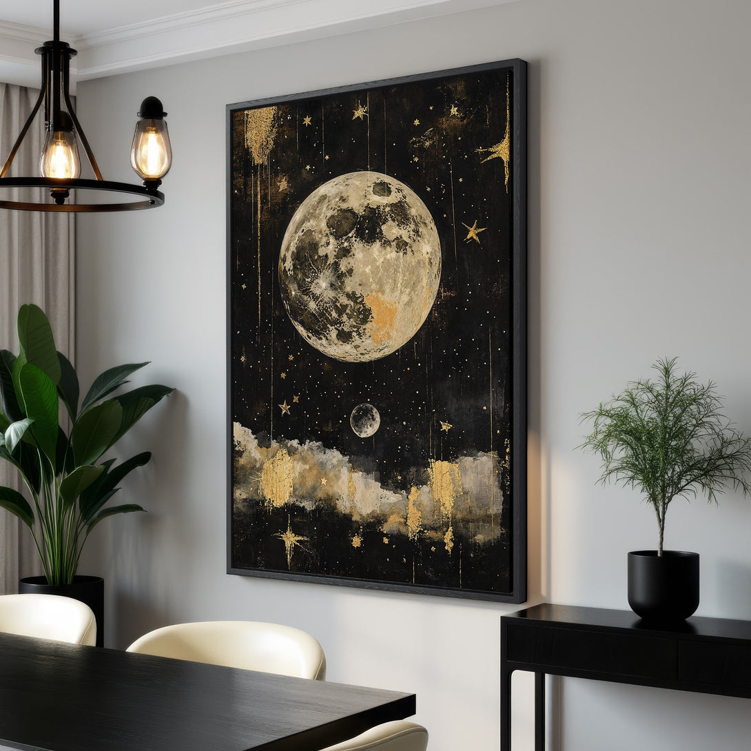 Framed Wall Art: Celestial moon and stars canvas print in black, gold, and cream. Modern art for home decor. Add a touch of elegance to your space.