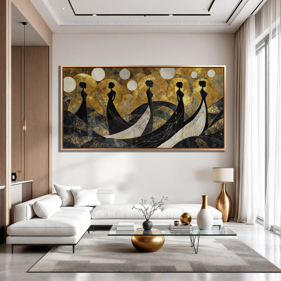 Framed Wall Art featuring elegant women in black and white dresses against a gold and black abstract background. Modern art for a stylish interior.