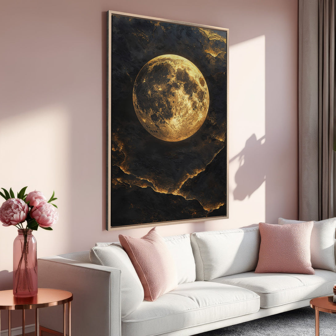 Framed Wall Art featuring a celestial moon in gold and black tones. Modern art print perfect for a living room with a blush and neutral color palette.