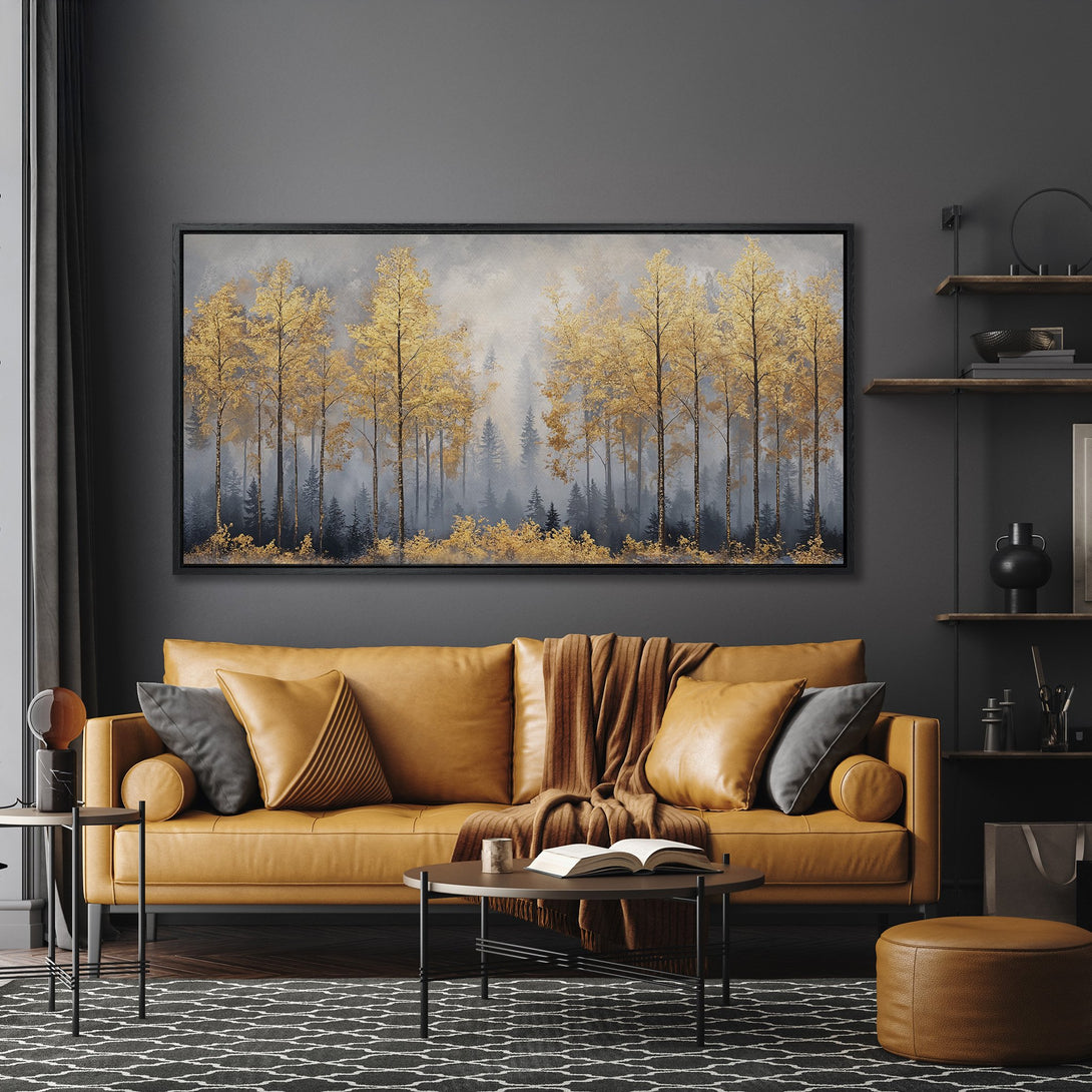 Framed Wall Art: Golden forest landscape canvas print in a modern living room. Features gold, gray, and brown tones. Perfect for adding warmth and style.
