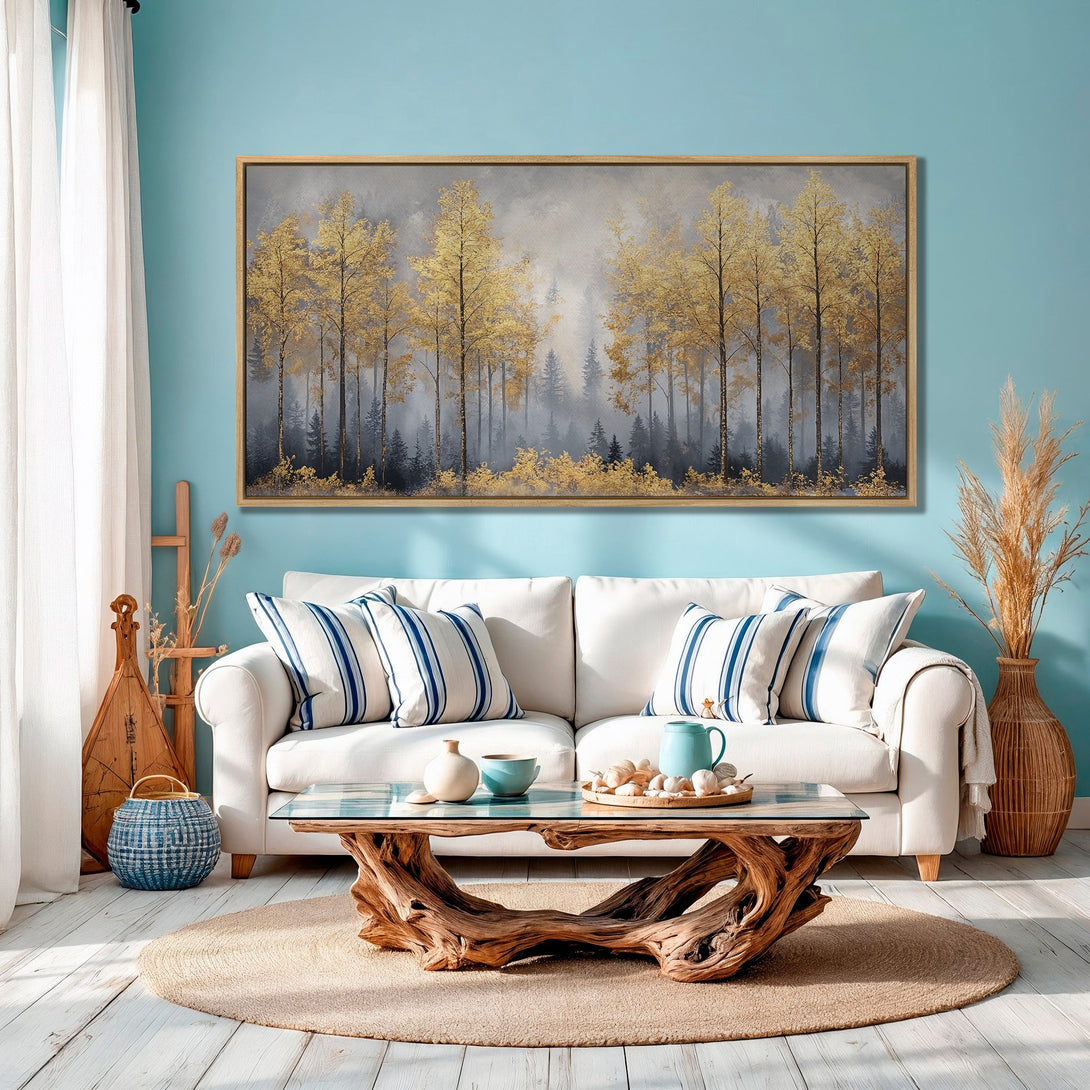 Framed Wall Art: Golden forest scene in a modern living room. Features gold and grey tones, perfect for adding a touch of elegance to your space.