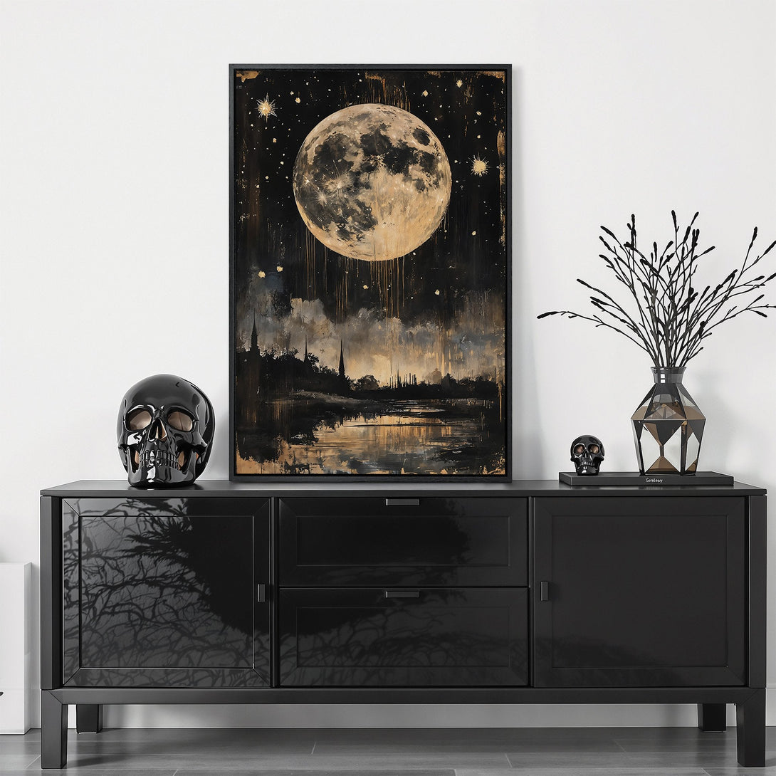 Framed Wall Art featuring a stunning moon over water in a gold and black abstract style. Perfect for adding a touch of celestial beauty to your home.