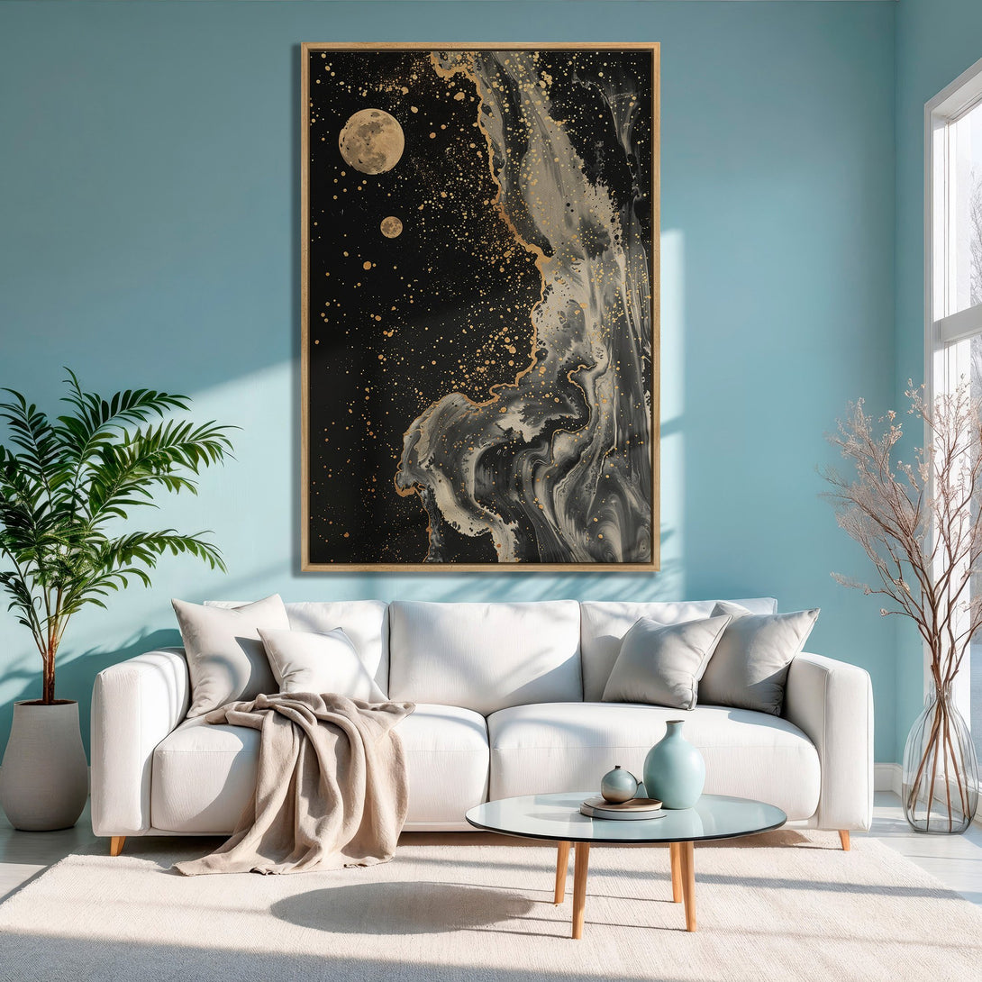 Framed Wall Art: Abstract black and gold canvas print in a modern living room. Features a celestial design with gold accents.