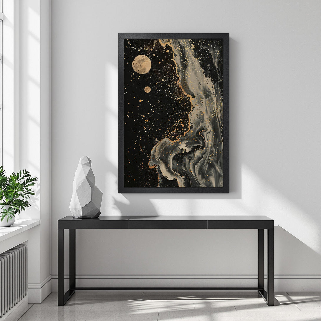 Framed Poster featuring abstract space art with moons, black, gold, and white color palette. Elevate your space with this unique art print.