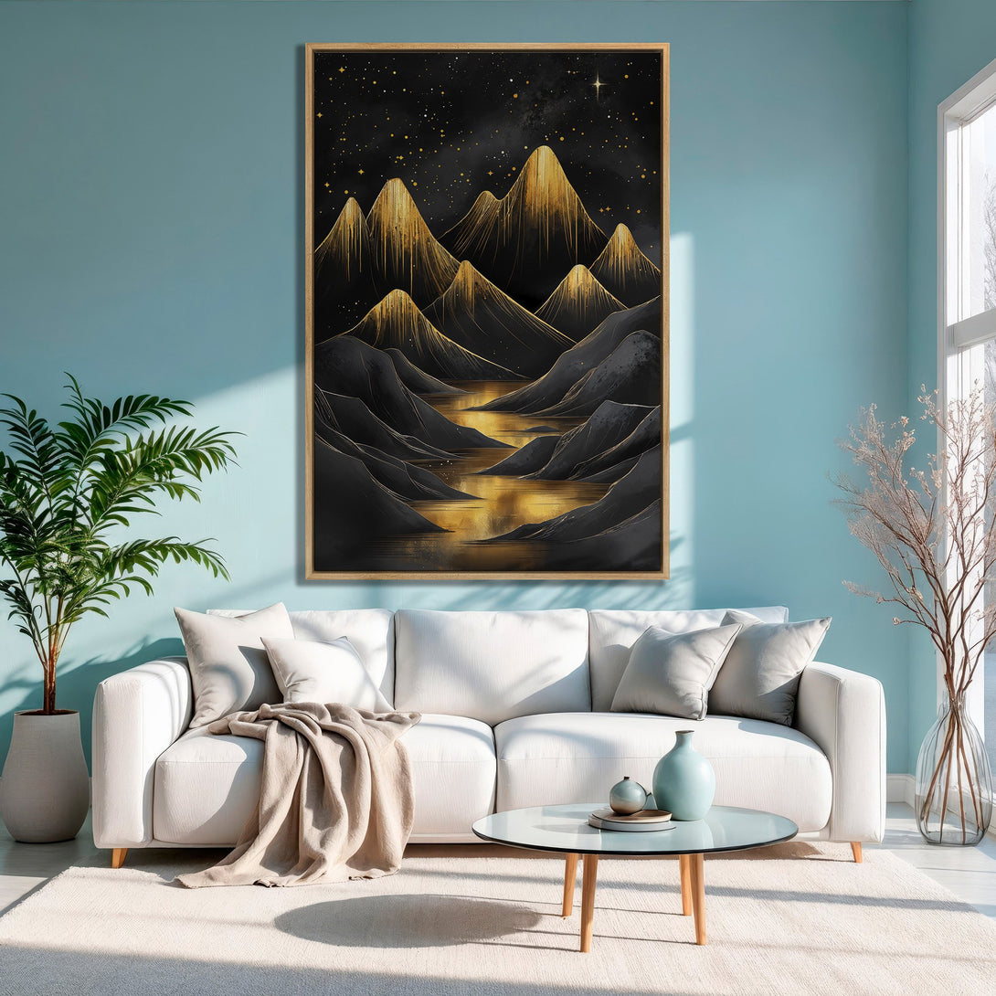 Framed Wall Art: Gold mountain landscape Canvas Print, modern art with black, gold, and gray color palette, displayed in a stylish living room.
