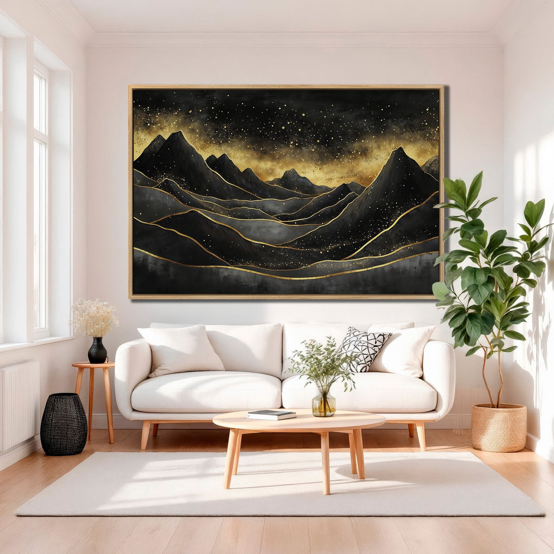 Framed Wall Art featuring a black and gold abstract mountain landscape. Modern art piece with a luxurious color palette, perfect for home decor.