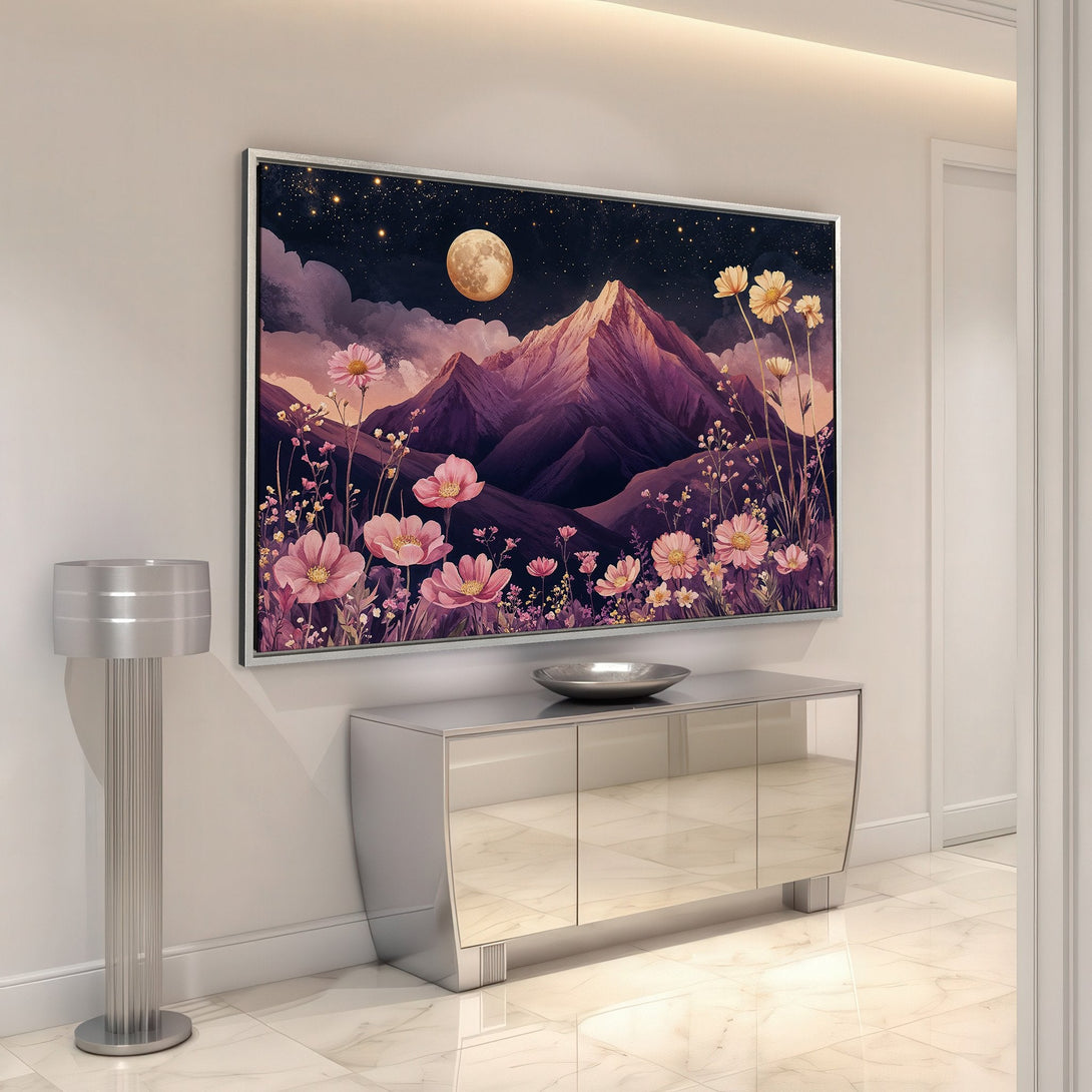 Framed Wall Art featuring a dreamy mountain landscape with pink flowers, a full moon, and a dark purple color palette. Perfect for adding a touch of serenity.