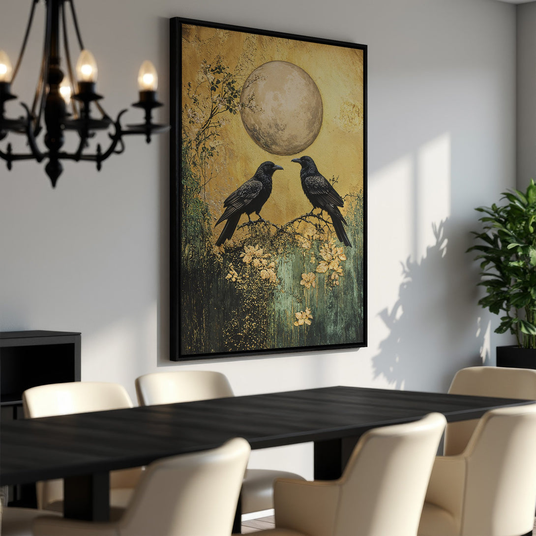 Framed Wall Art featuring two black crows on a branch, set against a golden and green background. A stunning piece of art with a moody, elegant style.