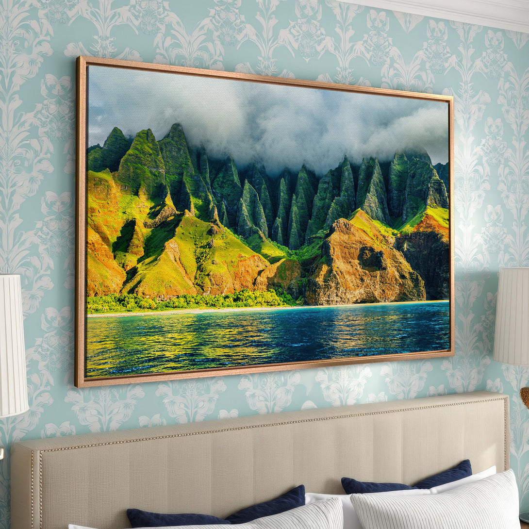 Framed Wall Art of a vibrant mountain landscape. Featuring lush green and golden hues, with a turquoise ocean, perfect for adding a touch of nature to your decor.