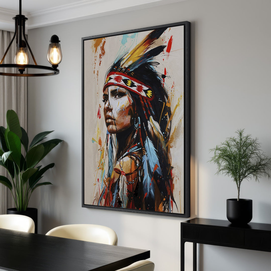 Framed Wall Art featuring a Native American woman in an abstract style. Earthy tones with pops of red, blue, and yellow create a stunning, artistic canvas print.