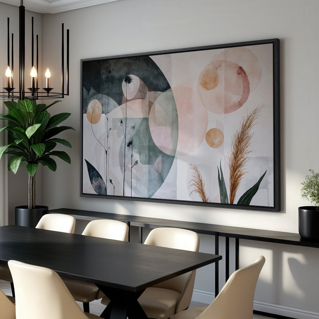 Framed Wall Art: Abstract watercolor print in a modern dining room. Features a soft, neutral color palette with blush pink and sage green tones.