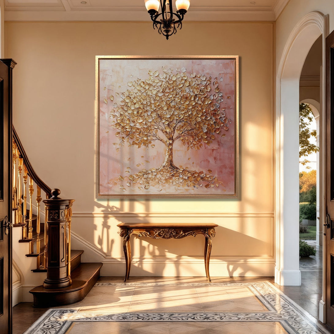Framed Wall Art: Textured gold tree art in a warm, inviting entryway. Earthy tones of gold and pink create a luxurious, modern aesthetic.