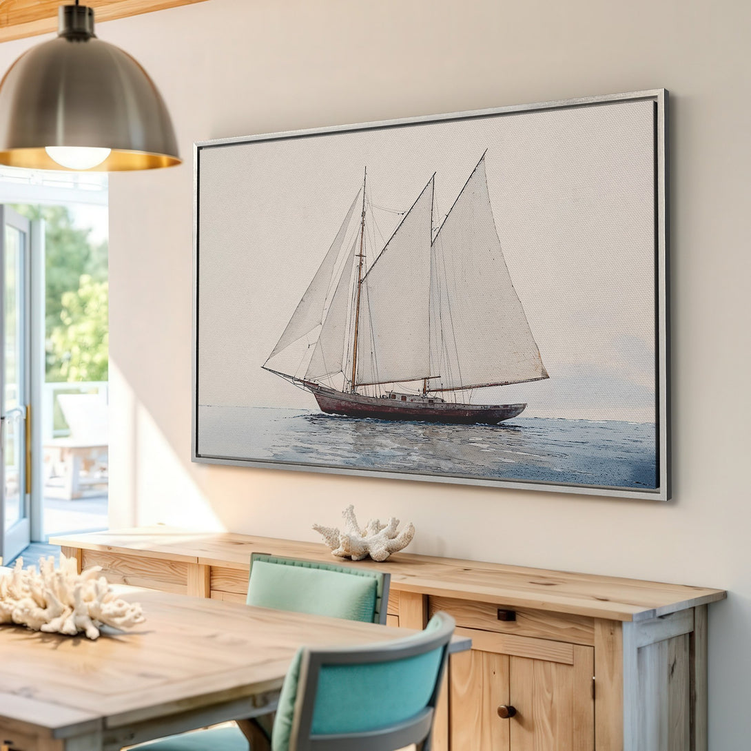 Framed Wall Art: Coastal sailboat art in muted blue and beige tones. Perfect nautical decor for a serene living space.
