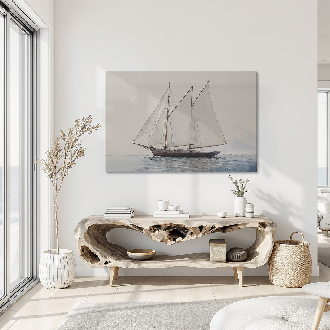Framed Wall Art featuring a sailboat in muted blues and browns. Coastal decor inspiration for your home. Canvas Print adds a touch of elegance.