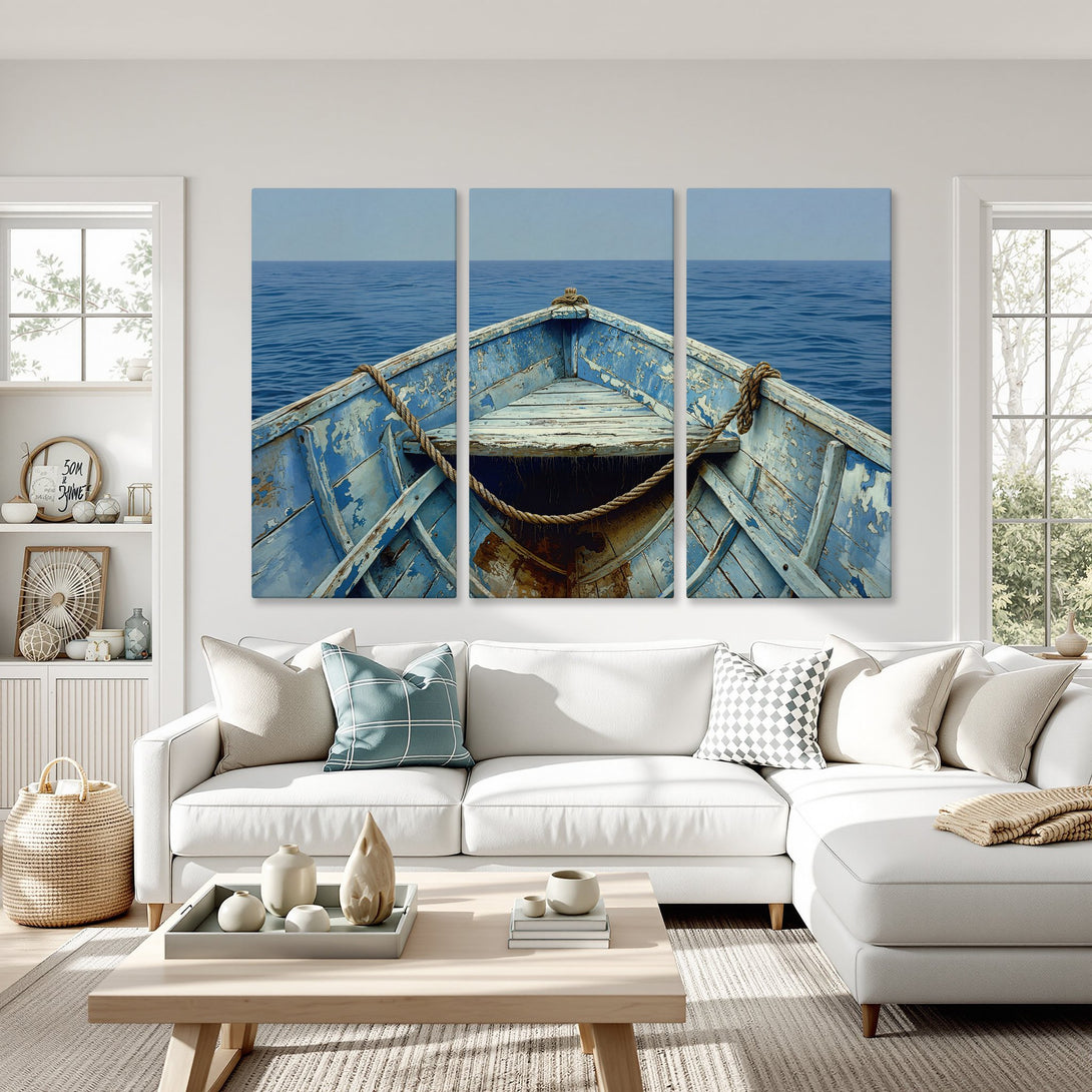 Canvas Print of a weathered blue boat on the sea, serene coastal art in blue and neutral tones. Perfect for a nautical living room.