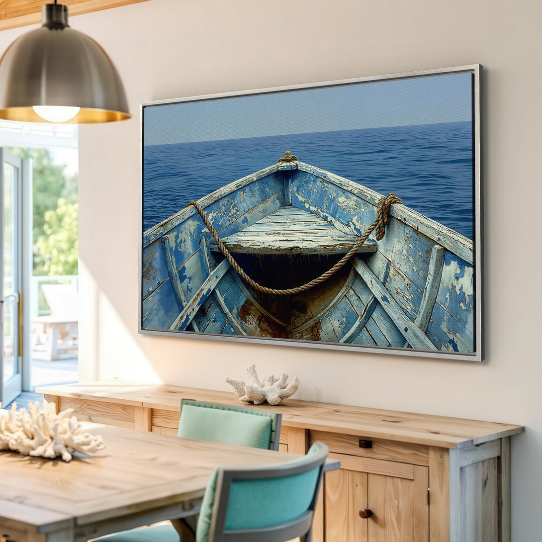 Framed Wall Art: Rustic blue boat on the sea. Coastal decor with a calming blue and neutral color palette. Perfect for a beach house vibe.