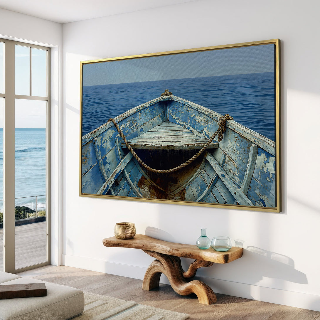 Canvas Print of a weathered blue boat on the sea. Coastal art style with a calming blue and neutral color palette. Perfect for a serene home.