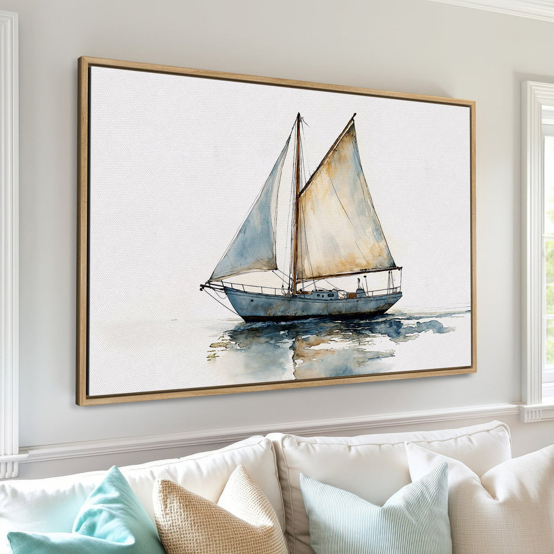 Framed Wall Art: Watercolor sailboat print in cool blue and beige tones. Coastal decor inspiration for your home.