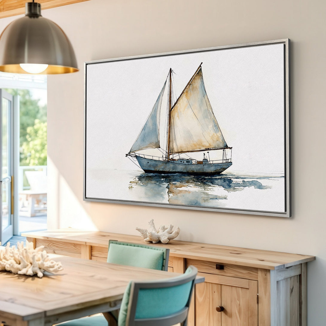 Framed Wall Art: Watercolor sailboat print in a coastal interior. Features a serene, blue and beige color palette. Perfect nautical decor for your home!