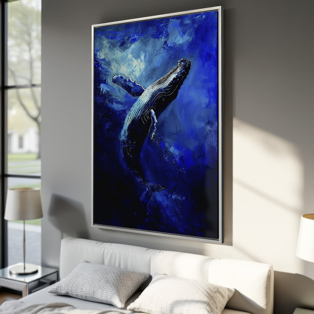 Framed Wall Art: Abstract whale painting in shades of blue. Modern, textured artwork adds a splash of ocean-inspired art to any room.