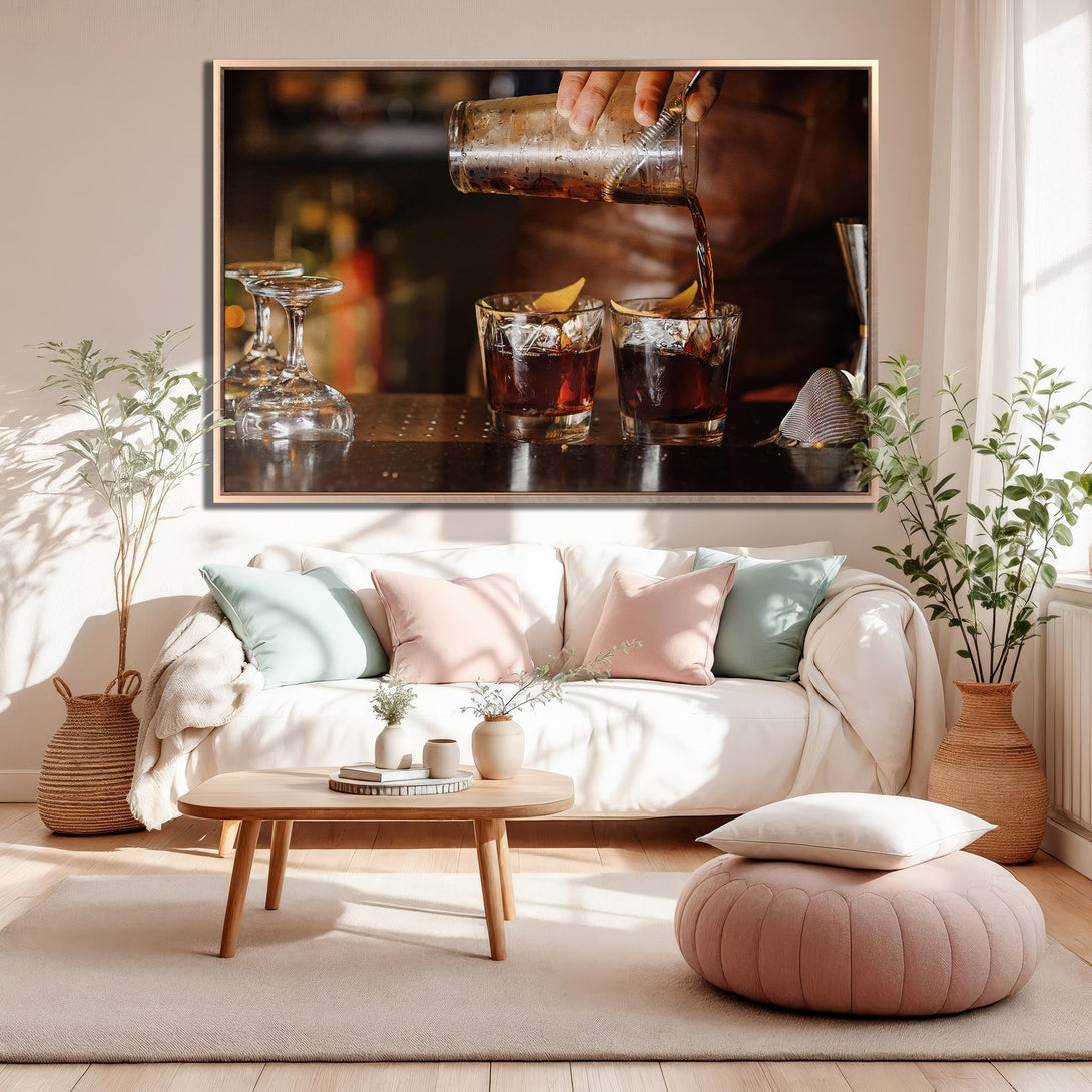 Framed Wall Art: Cocktail pouring scene in warm tones. Modern living room decor with a neutral palette and pops of color. Elevate your space!