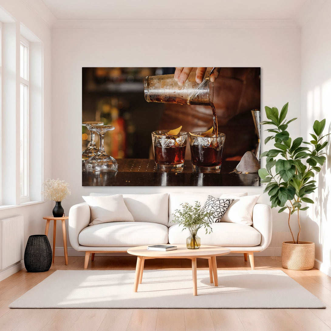 Framed Wall Art: Cocktail being poured, warm color palette, elegant decor. Perfect for home bars & living rooms. Shop now!