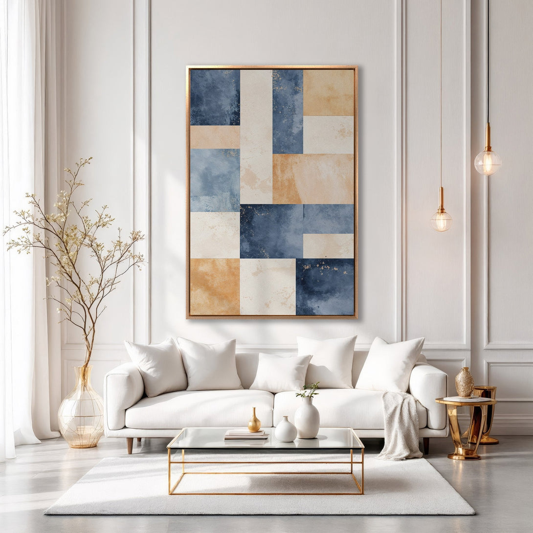 Framed Wall Art in a modern living room. Abstract geometric design with blue, beige, and gold tones. Elevate your space with this stunning canvas print!