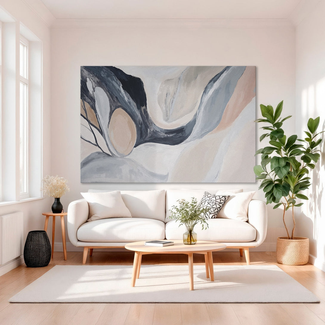 Framed Wall Art: Abstract painting in neutral tones (blush, gray, navy) adds elegance to living room decor. Modern art for stylish homes.