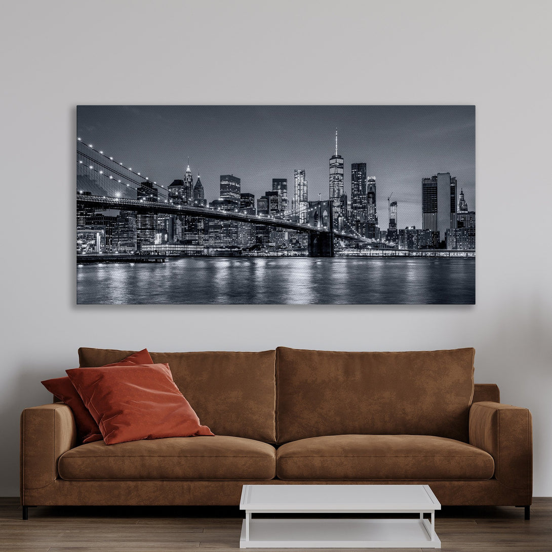 Framed Wall Art: NYC skyline Canvas Print in black and white. Modern decor with a gold frame, perfect for adding a touch of urban elegance to your space.