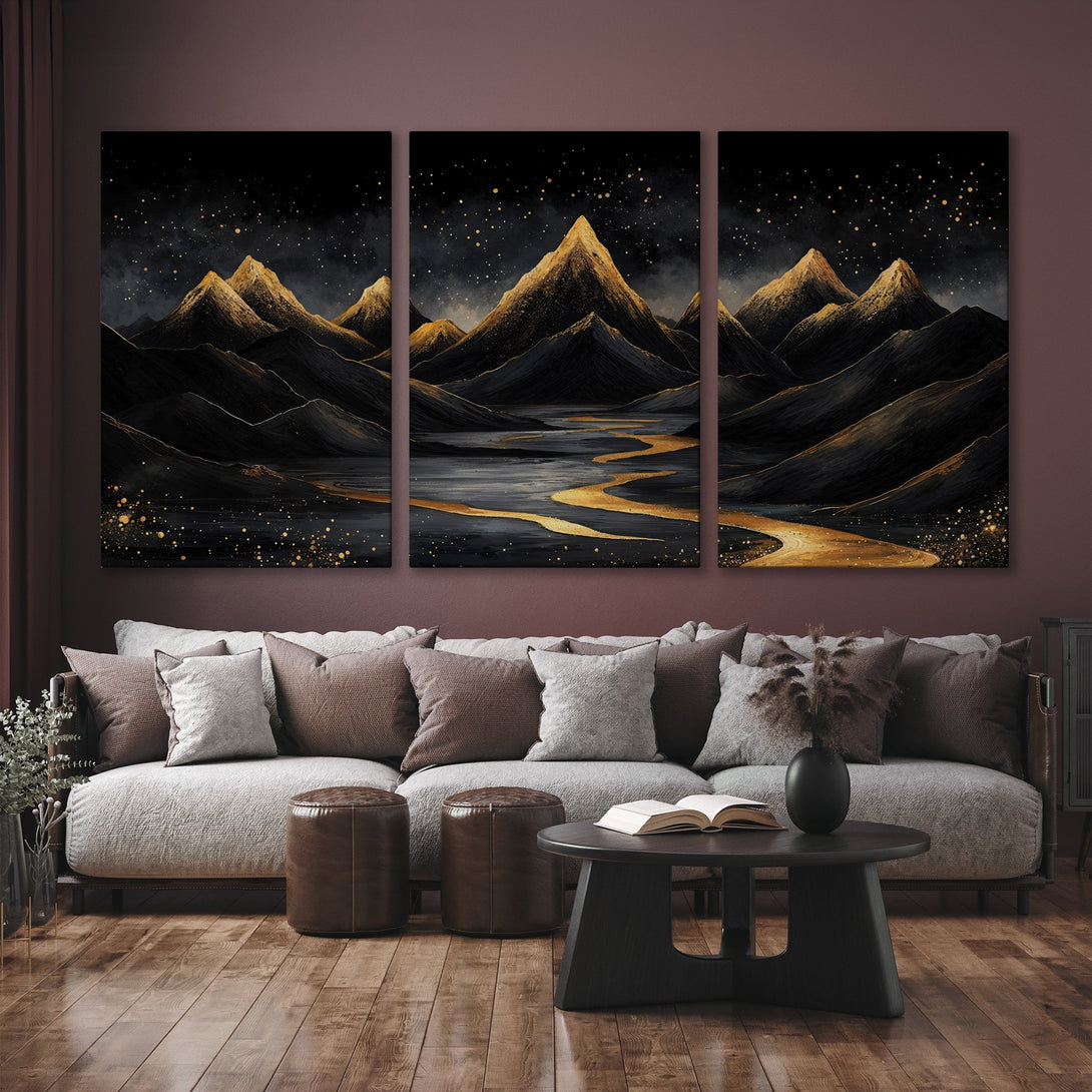 Canvas Print of a mountain landscape in black, gold, and gray, creating a dramatic and elegant interior.