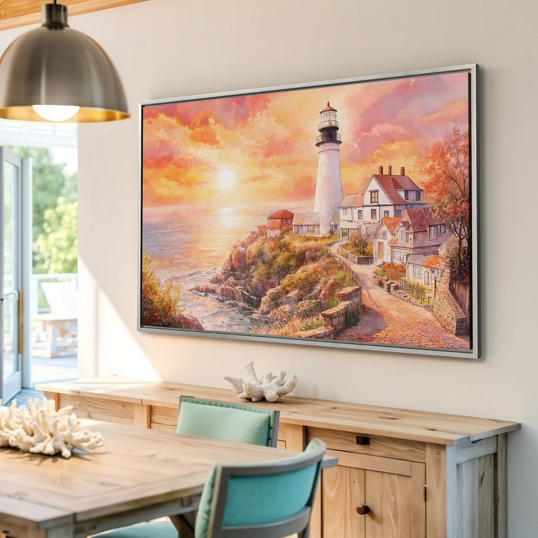 Framed Wall Art: Lighthouse at sunset canvas print in warm orange and pink tones. Coastal landscape art for a cozy home.