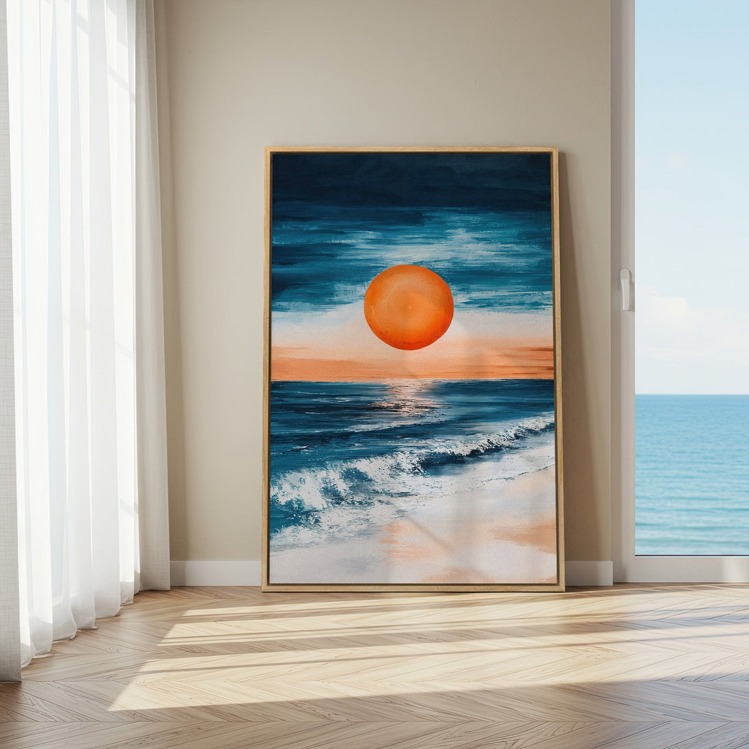 Framed Wall Art: Abstract ocean scene canvas print with vibrant blues, orange sun, and beach. Perfect coastal decor for your home.