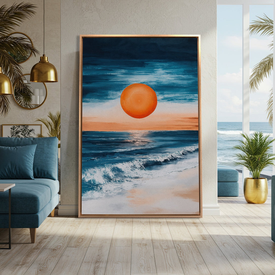 Framed Wall Art: Abstract ocean sunset canvas print in blue, orange, and white. Coastal-inspired artwork perfect for living room decor.