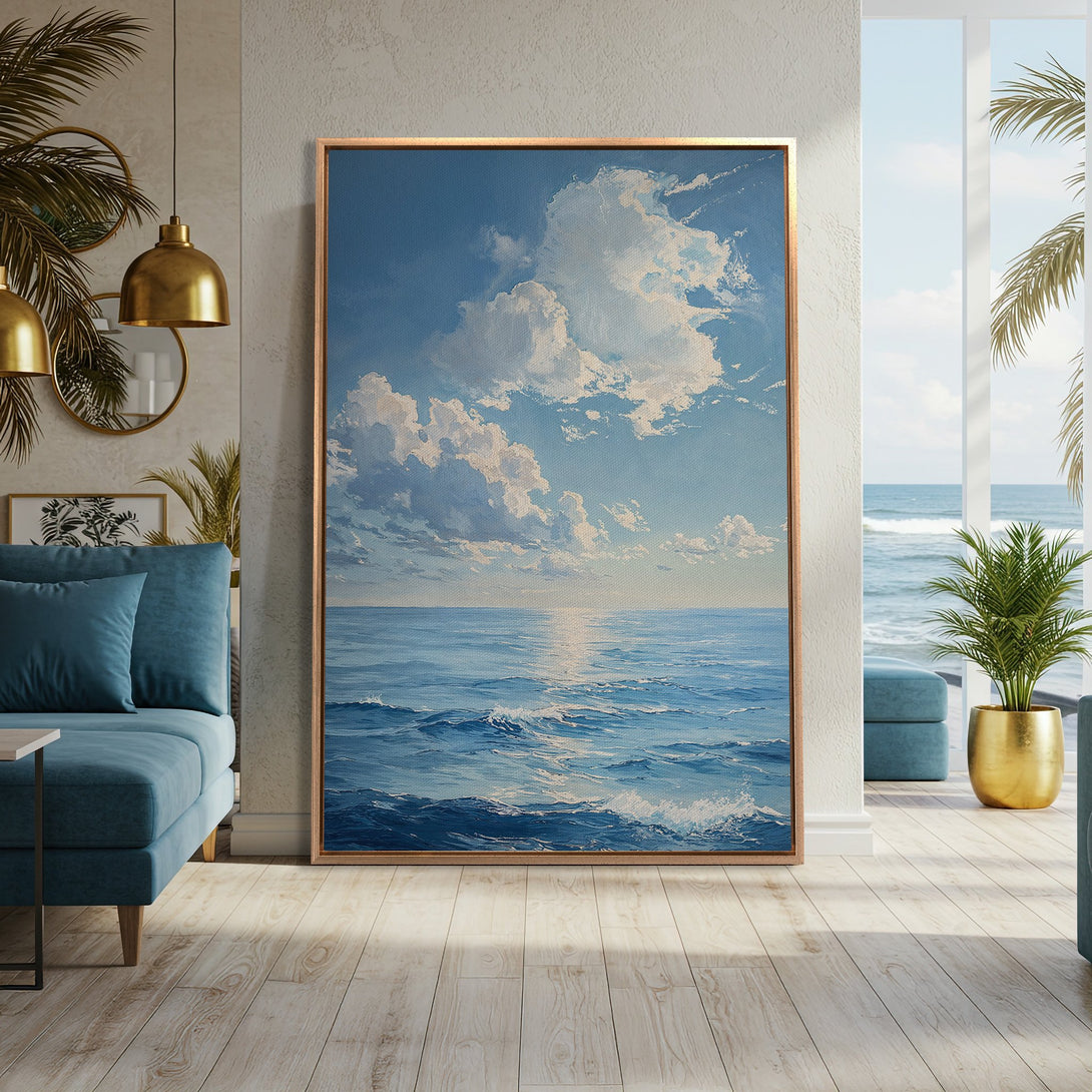 Framed Wall Art of ocean scene in blue and white hues. Coastal art print adds serene style to any room. Perfect for a calming living space.