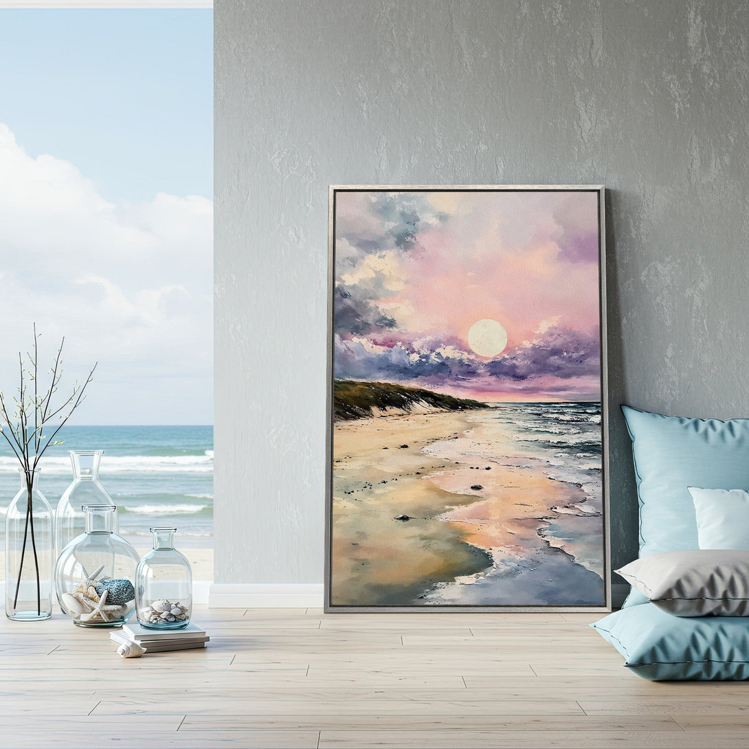 Framed Wall Art of a beach sunset in a serene interior. Beautiful canvas print with a pastel color palette, perfect for coastal decor.