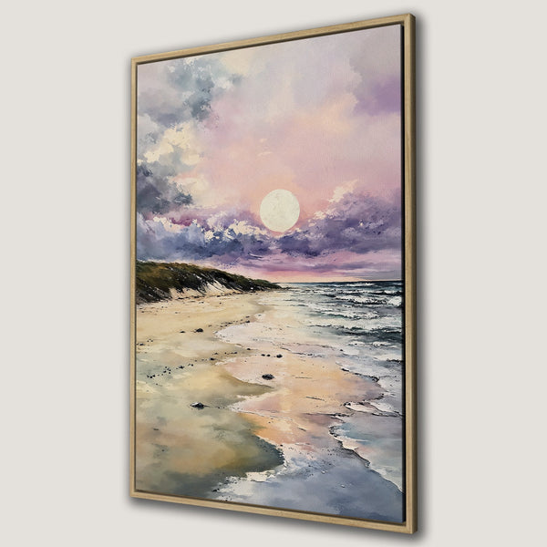 Framed Wall Art of a serene beach sunset. Watercolor style with a pink, purple, and blue color palette. Perfect for adding a calming touch to any room.